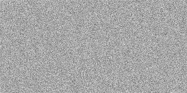 istock Noise texture background with grainy rough effect in black and white. Rough and abstract noise pattern background with grunge texture. Ideal for print, packaging, fabric, and design projects 2235589174