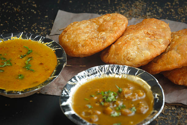 istock Traditional Indian Kachori with Aloo Sabzi and Chole 2235589308