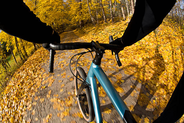 istock Autumn Road Bike Ride Shadow 2235591383