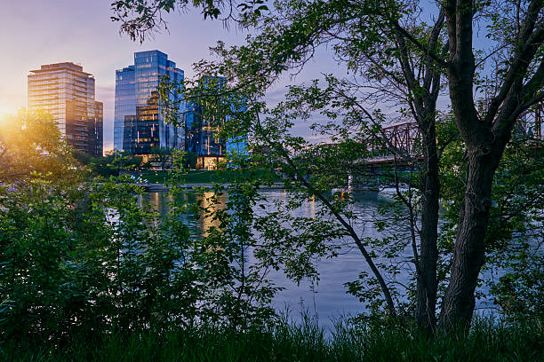 istock City skyline at twilight with park foreground in Saskatoon 2235592562