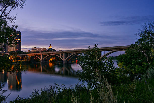 istock City skyline and riverside park at dusk in Saskatoon 2235592581