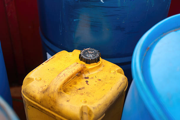 istock A yellow plastic chemical gallon without any safety label or MSDS. 2235593749