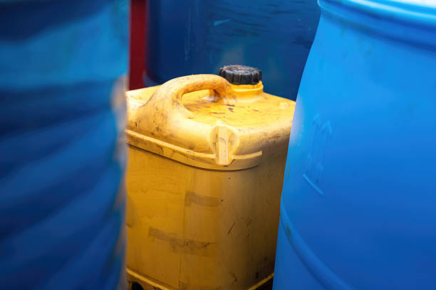 istock A yellow plastic chemical gallon without any safety label or MSDS. 2235593752