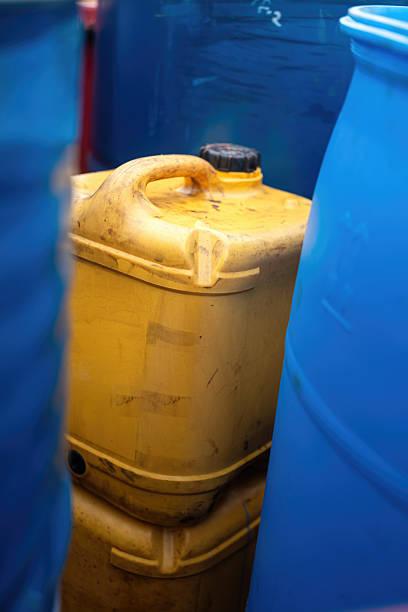 istock A yellow plastic chemical gallon without any safety label or MSDS. 2235593755