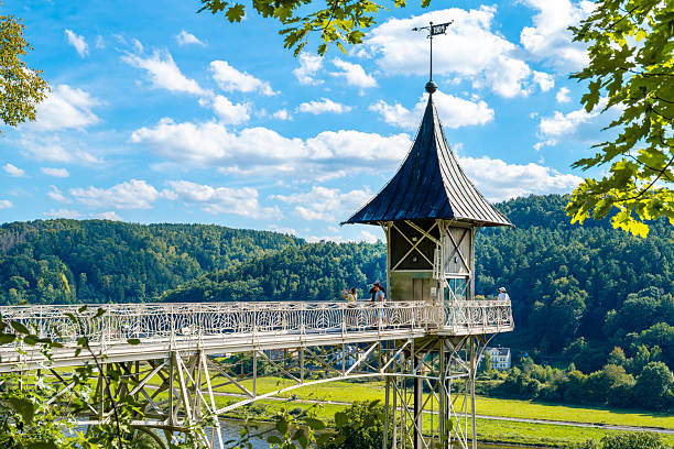 Bad Schandau, Germany, 1.09.2025: Historic Art Nouveau elevator tower from 1904 in summer lightTourist attraction : Art Nouveau steel construction with a scenic view