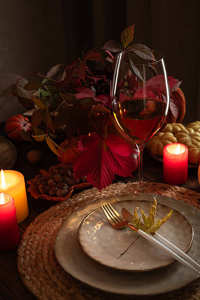 istock Autumn Table Setting with Plates, Wine, Pumpkins and Seasonal Decor 2235597212