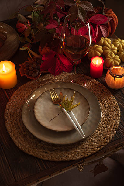 istock Autumn Table Setting with Pumpkins, Candles and Leaf Decor 2235597222
