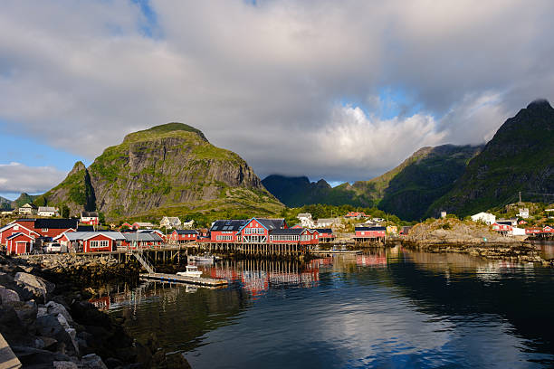 istock Majestic Lofoten landscape showcasing tranquil waters and iconic red cabins under dramatic skies 2235598119
