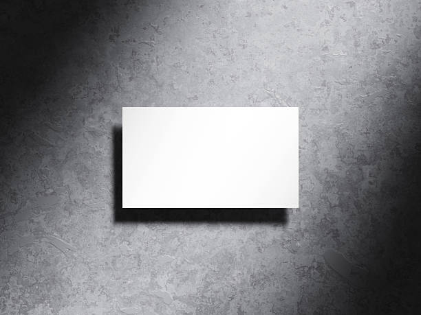istock Minimalistic business card on cement background with soft shadows. 2235599644