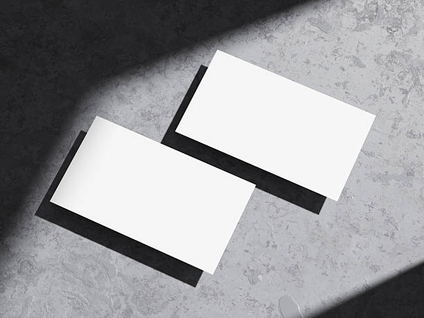 istock Clean and modern business card mockup on rough cement background. 2235599651