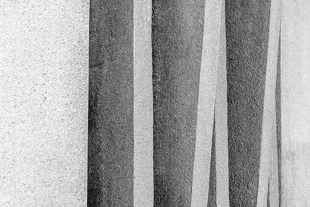 Monochrome abstract texture vertical stripes concrete wall desig