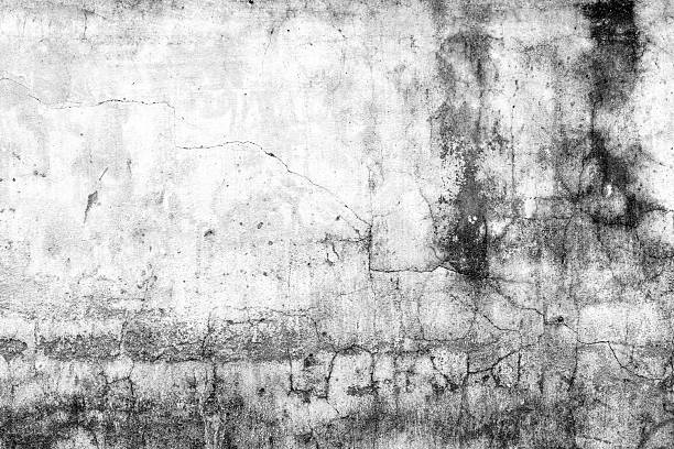 istock Aged textured concrete wall with cracks and stains 2235603065
