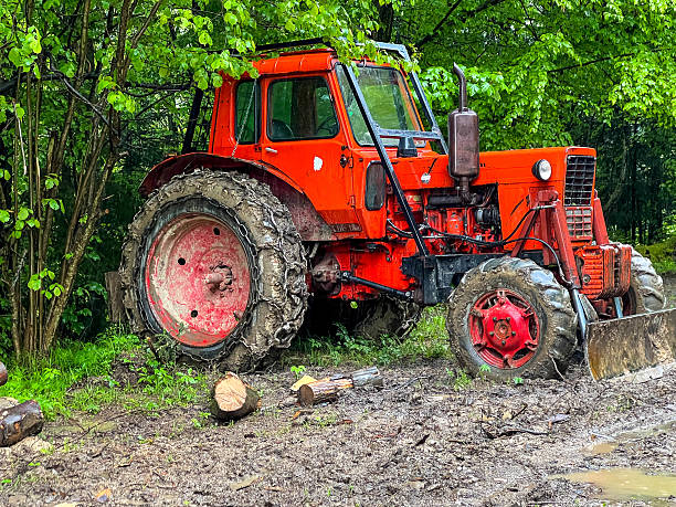 istock A red tractor with chains on its wheels, adapted for forest work in mountainous conditions in the Bieszczady Mountains in Poland 2235603378