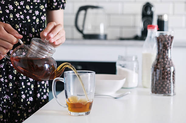 istock Little Girl Making A Black Tea 2235605862