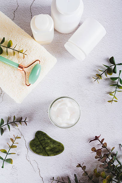istock Moisturizing cream with beef tallow in a jar on the table top and vertical view 2235610343