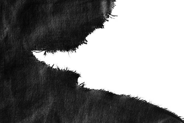 torn old black rag with holes on a white background