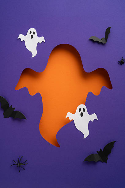 istock Creative vertical Halloween-themed design with cutout ghosts, bats, spiders, and vibrant colors 2235616988
