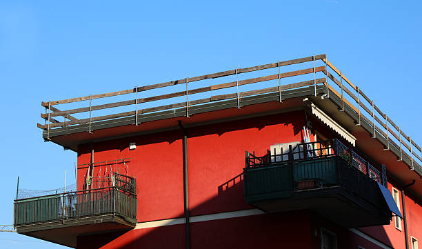 istock installed safety barrier for workers safety to prevent falls during maintenance work on the roof of the condominium without people 2235618405