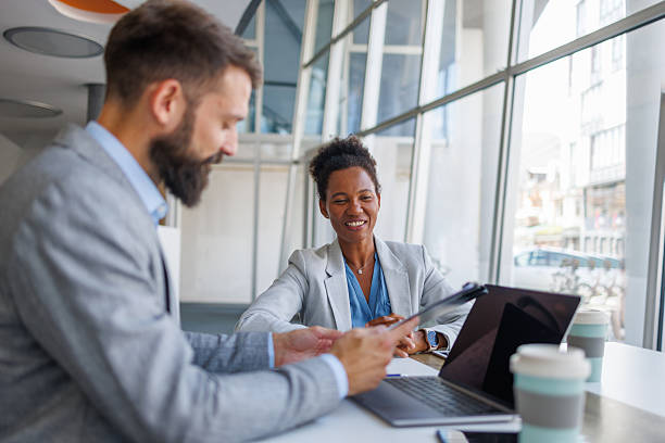 istock Business people working together in modern office 2235619648