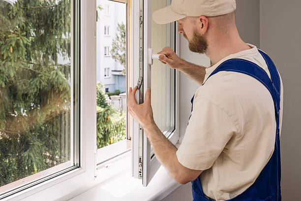 istock Repairman installing a PVC window frame in a residential apartment 2235623007