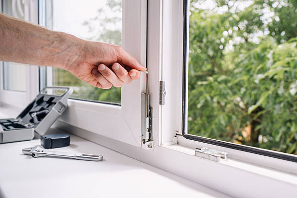 istock Repairman installing a pvc window frame for enhanced energy efficiency in a home 2235623043