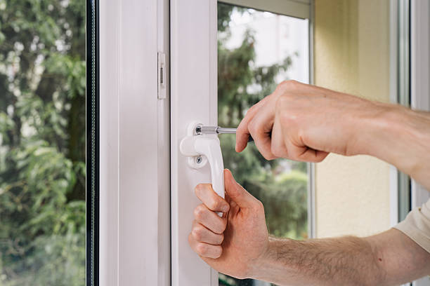 istock Repairman installing a PVC window frame in a residential apartment 2235623072
