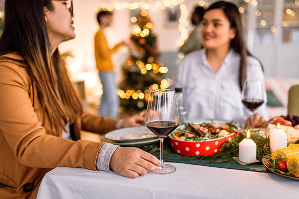 istock Christmas Eve celebration dinner for friends 2235636453