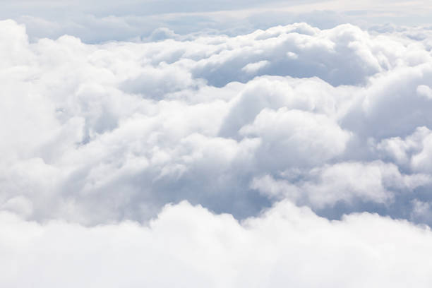 istock Aerial capture a white layer of fluffy clouds 2235637617