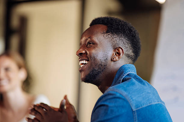 istock Smiling Man Enjoying Conversation and Interaction in an Informal Setting 2235638888