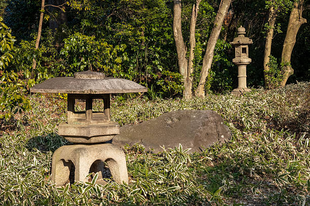 istock Serene Japanese Garden with Stone Lantern and Greenery 2235641712