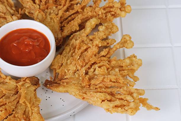 istock Close-Up Crispy Fried Enoki with Spicy Sauce 2235645988