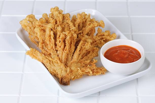 istock Fried Enoki Mushroom with Chili Sauce on White Tray 2235645994
