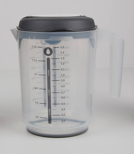 istock Clear plastic measuring cup with lid isolated nature background with clipping path 2235646027