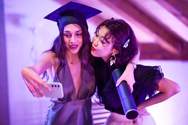 istock Graduation selfie capturing joyful celebration with friends and memories 2235647841