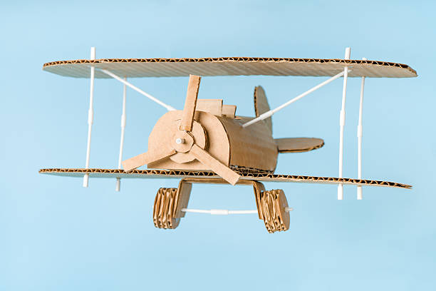 istock DIY handmade paperboard airplane idea for hobby store banner 2235648953