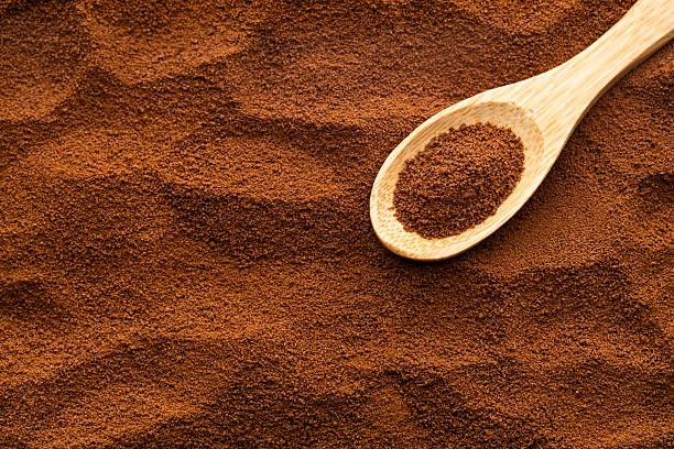 istock Dry instant ground coffee in a spoon - Coffea 2235649221