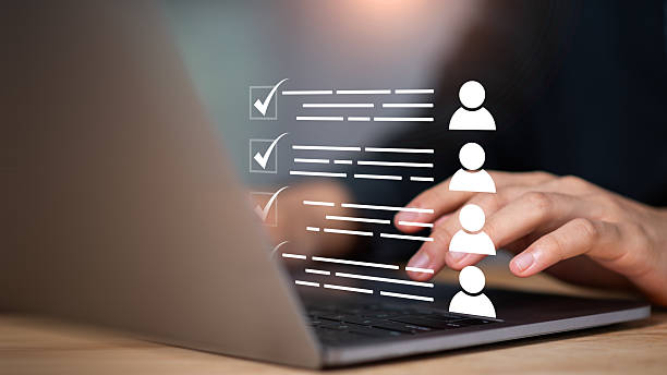 istock Digital recruitment interface showing checklist evaluation and candidate icons, representing an HR system automating hiring decisions, resume screening, and performance scoring for talent acquisition 2235650623