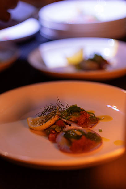istock Elegant Gourmet Scallop Dish on White Plate 2235662113