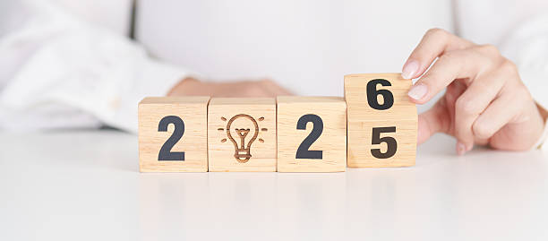 istock 2025 year change to 2026 year block with lightbulb. Business Idea, Creative, Thinking, brainstorm, Goal, Resolution, strategy, plan, Action, change and New Year start concepts 2235662581