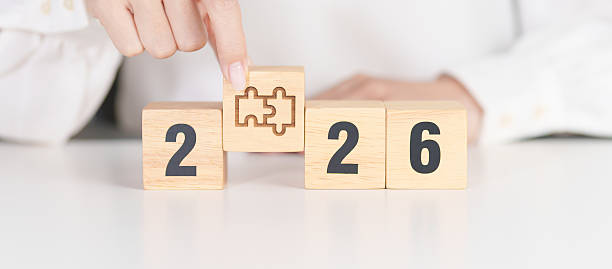 istock 2026 year block with jigsaw puzzle icon. Business Process, Team, teamwork, Goal, mission, Resolution, strategy, plan, Action, partnership, and New Year start 2235662582