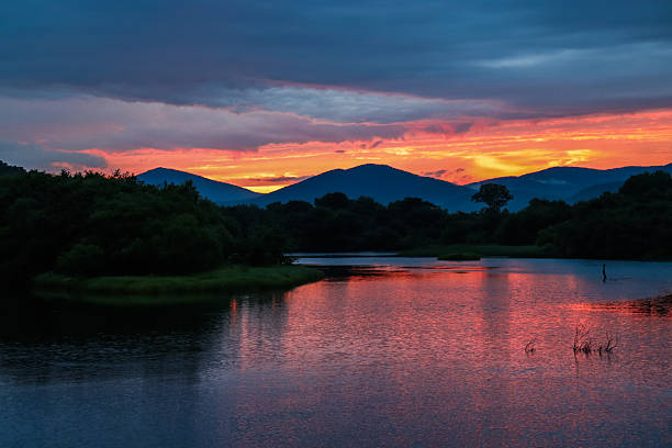 istock A beautiful sunset over the river. A journey through the wilderness. Taiga. 2235665795