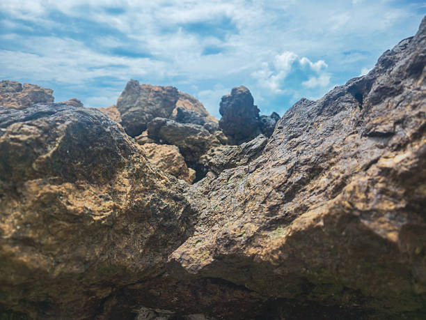 Silent Strength of Stones and Waves