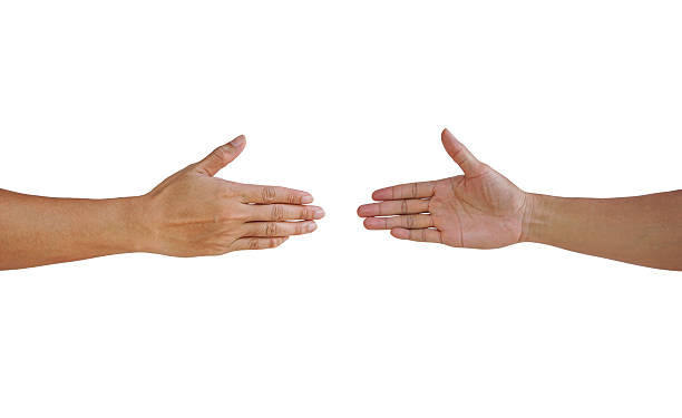 istock Two men's hands reaching out to shake hands isolated on white background. Hands greeting each other concept 2235668802