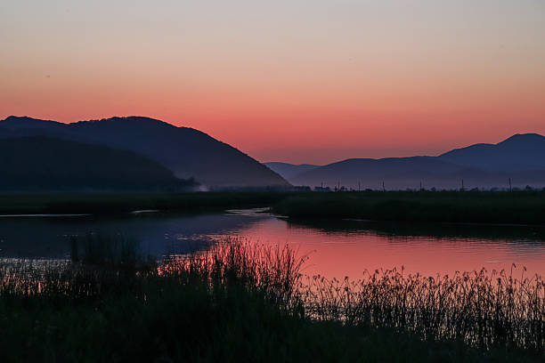 istock A beautiful sunset over the river. A journey through the wilderness. Taiga. 2235668986