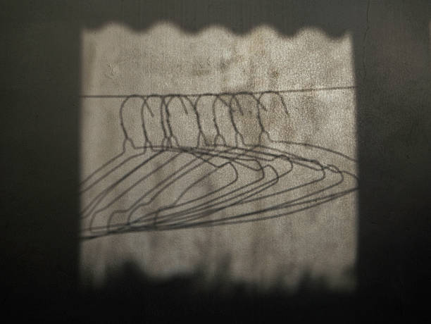 istock Shadow of hanger exposed to sunlight 2235677421