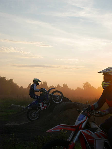 istock Enduro Jump at Sunrise of two 2235679421