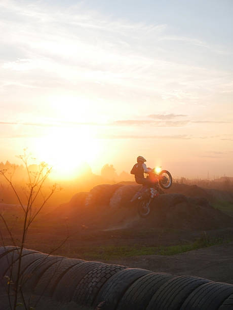 istock Motocross Rider at Sunset - Silhouette Jump 2235679464