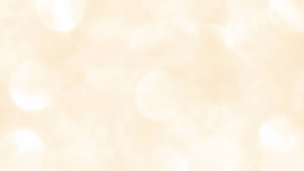 istock Golden yellow beige cream and white light glitter bokeh texture background. 2235681027