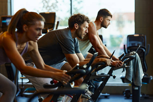 istock Stationary cycling class in a gym! 2235683537