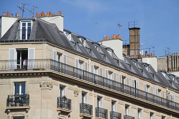 istock Parisian apartment building with ornate balconies. 2235685069
